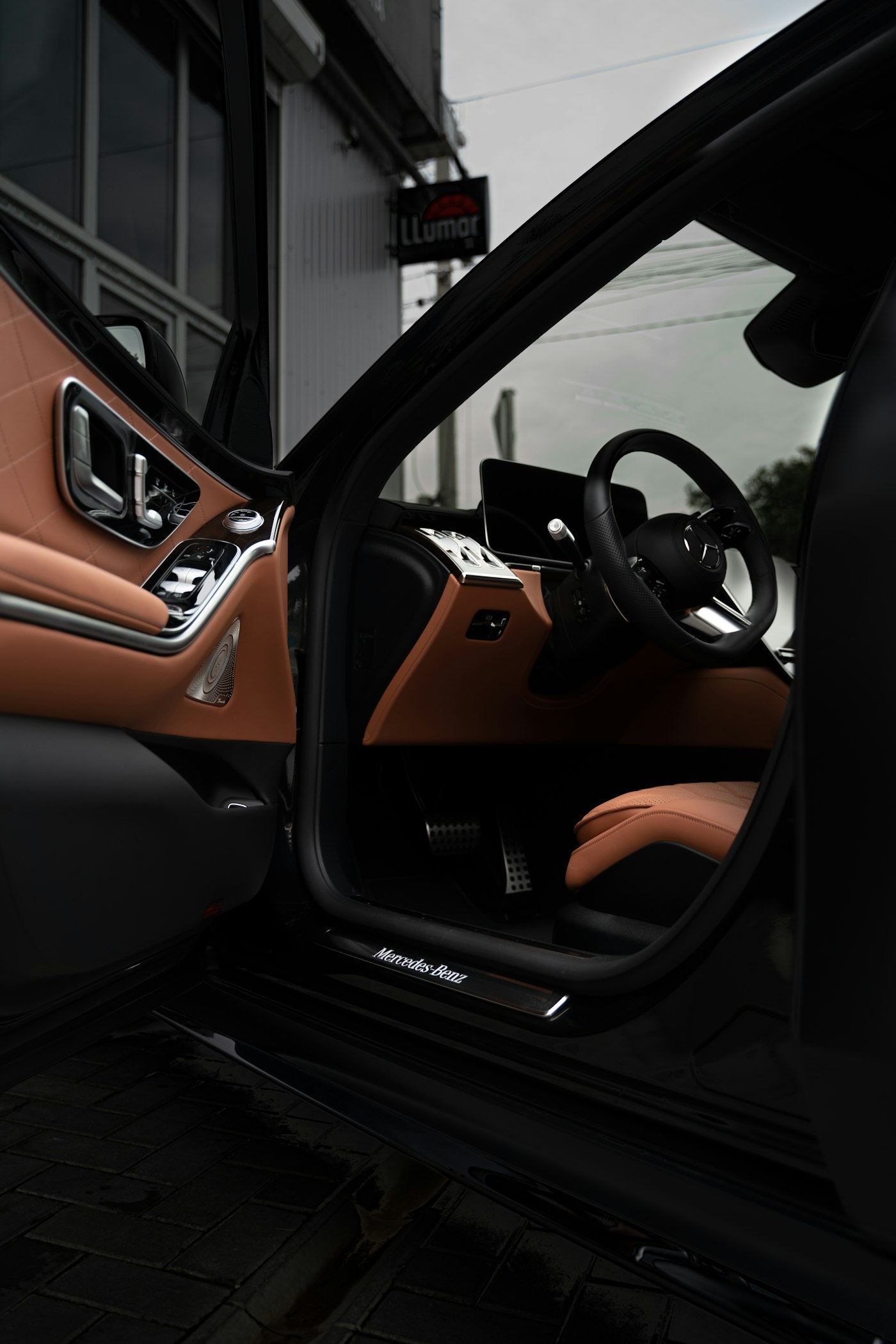 Leather interior seen through an open car door Leather interior seen through an open car door